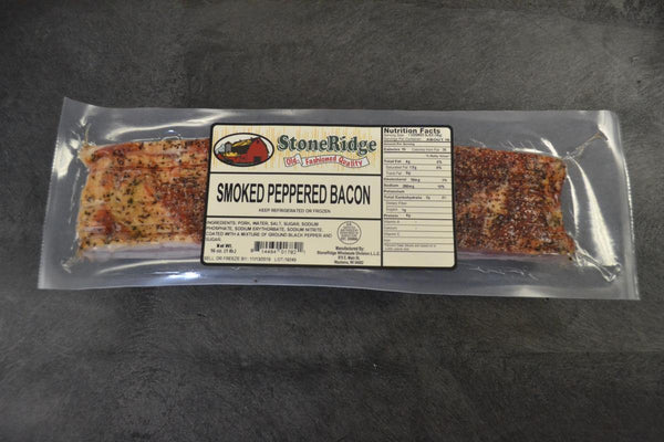 Smoked Peppered Bacon  - 16 Ounce Package on a gray background.