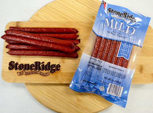 Mild Meat Sticks (7 ounces, 7 sticks) on a cutting board.