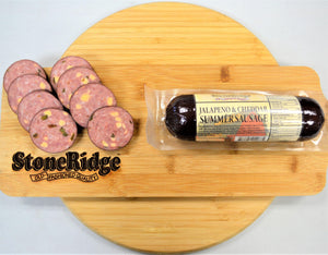 Jalapeno And Cheese Summer Sausage -  - 12 Ounce Package on a cutting board.