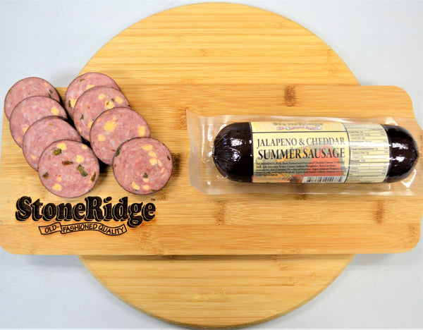 Jalapeno And Cheese Summer Sausage -  - 12 Ounce Package on a cutting board.