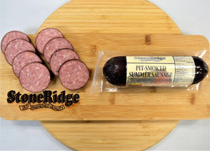 Pit Smoked Original Summer Sausage  - 12 Ounce Package on a cutting board.
