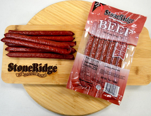 Beef Sticks  (7 ounces, 7 sticks) on a cutting board.