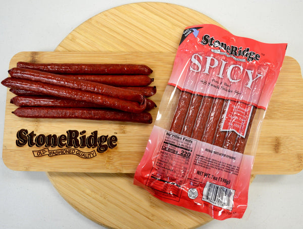 Spicy Meat Sticks - 7 ounces, 7 sticks on a cutting board.