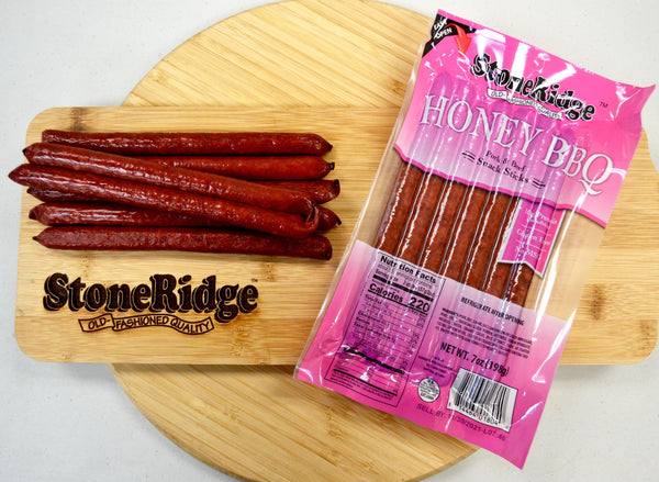 Honey BBQ Meat Sticks (7 ounces, 7 sticks) on a cutting board.
